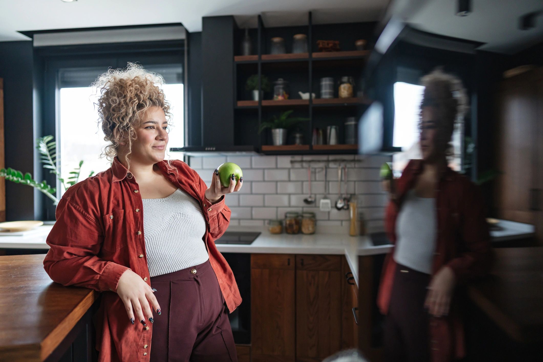 Person choosing healthy food as part of a wellness plan